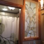 A completely original stained glass window built to allow for privacy and natural light