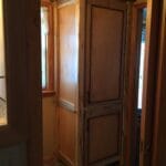Fully custom linen cabinet built for a bathroom renovation